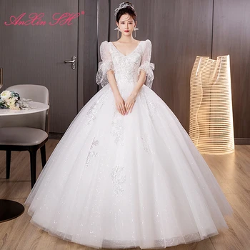 AnXin SH princesė baltųjų gėlių nėrinių vestuvių suknelė vintage v kaklo duobute kristalų blyksnius rankovės lankas nuotaka kamuolys suknelė vestuvių suknelė